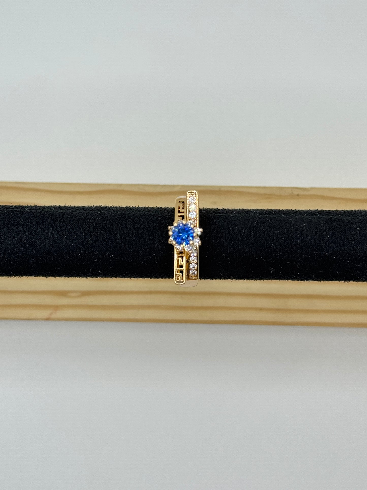 Gold Tone Ring with Blue Stone and Geometric Detail