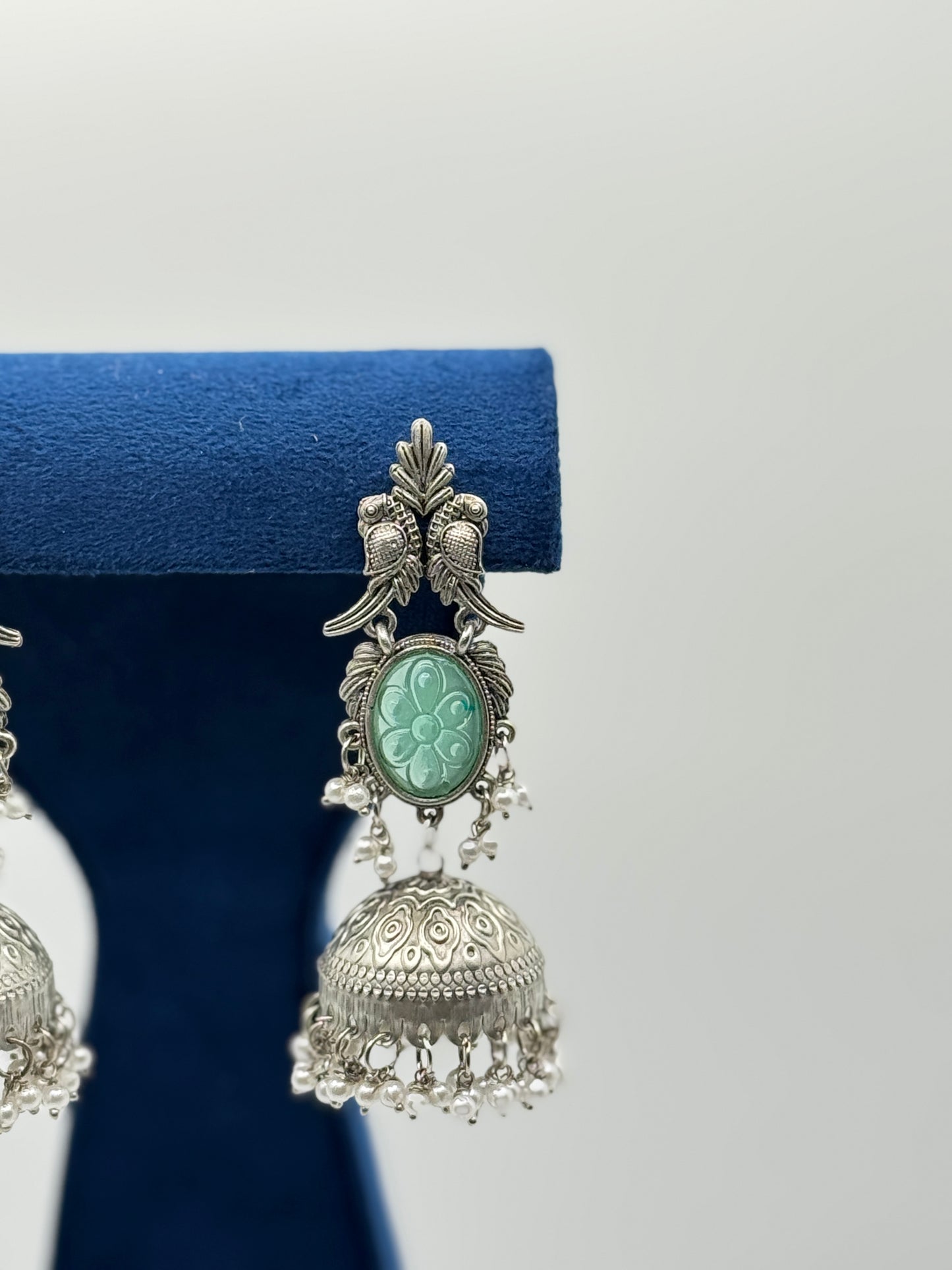 Green Carved Stone Peacock Jhumkas