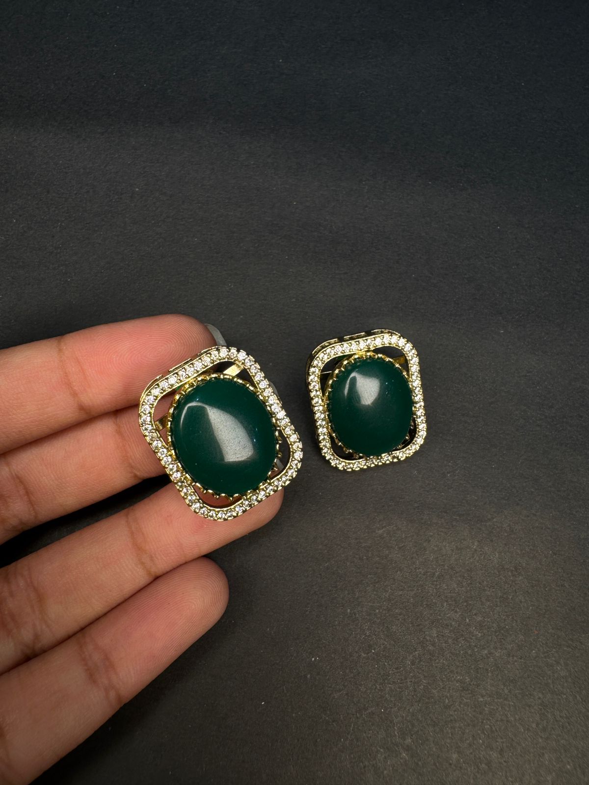 Deep green stone studded earrings