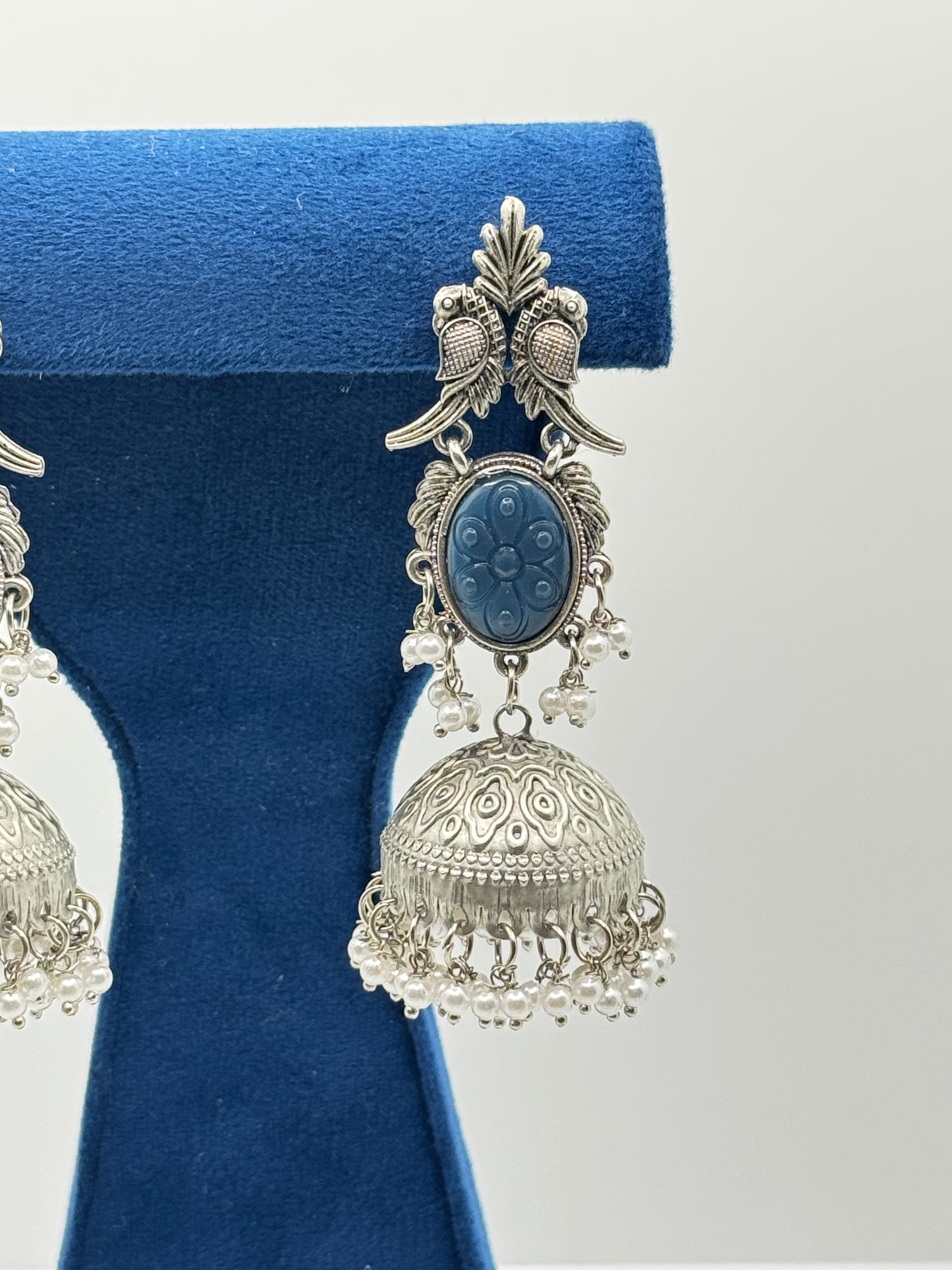 Deep Blue Carved Stone Peacock Jhumkas