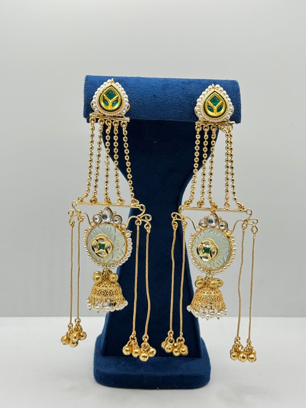 Multi-Tiered Gold earrings with white stone