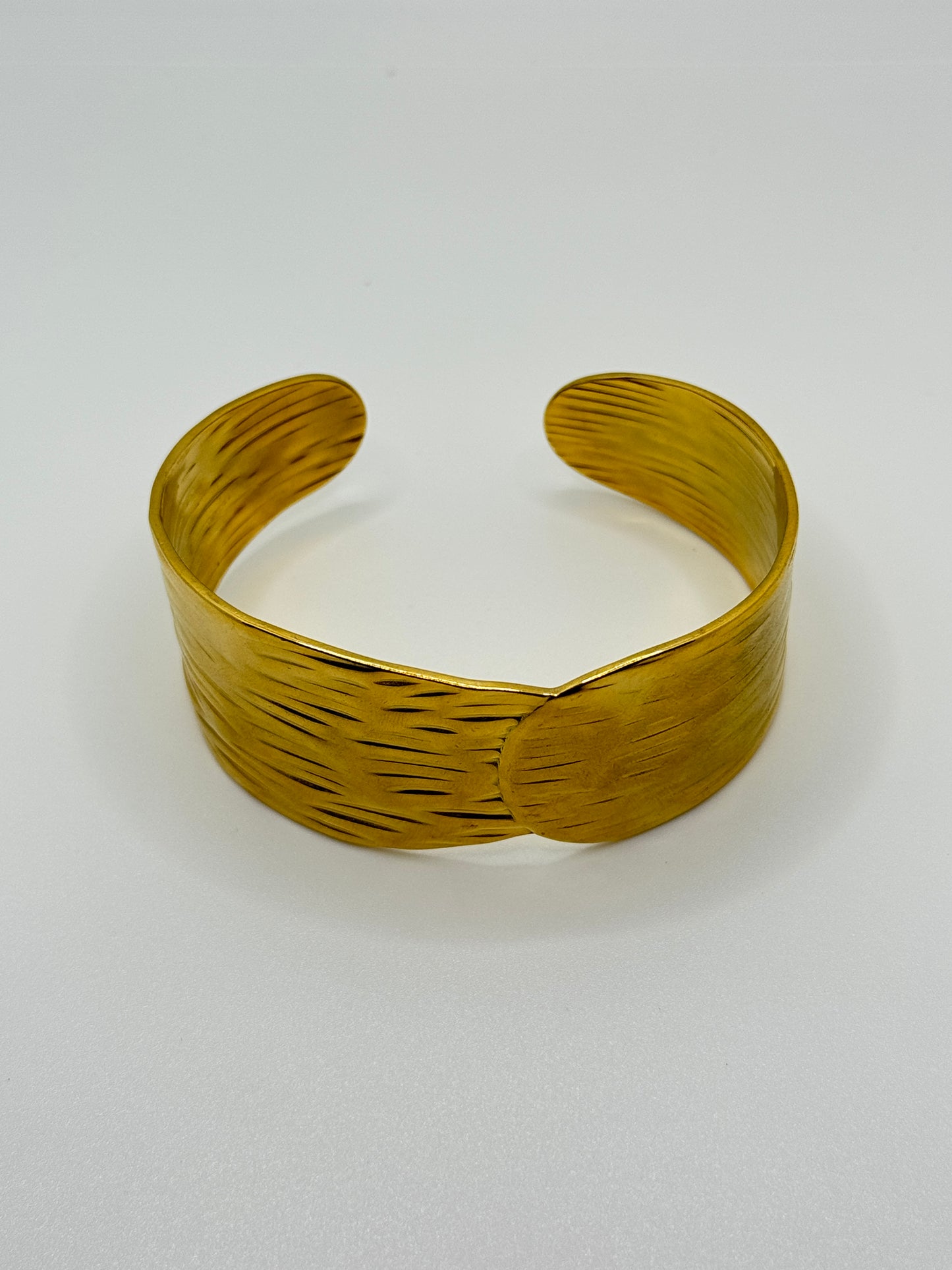 Wide Textured Gold Cuff Bracelet with Interlocking Design
