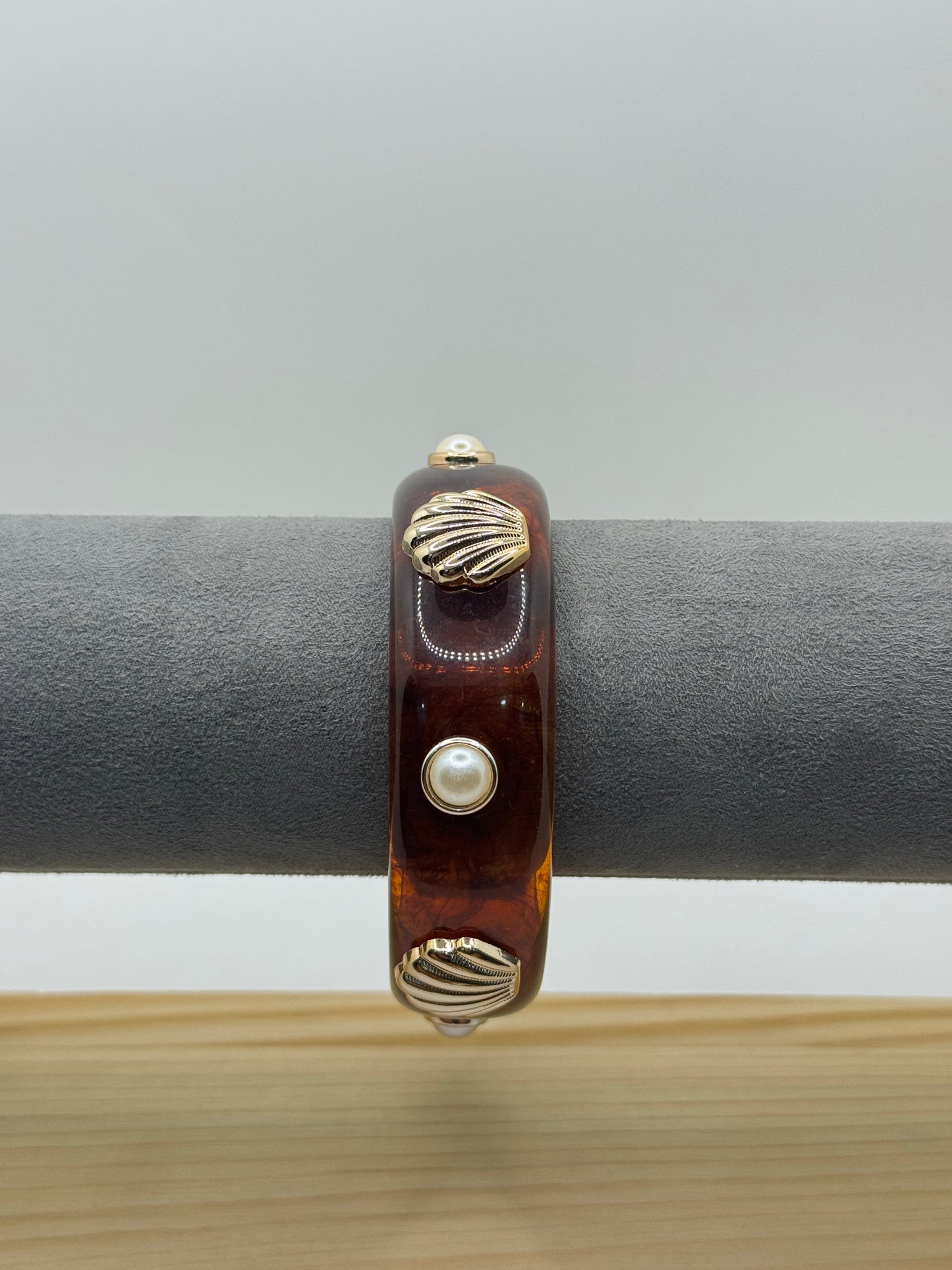 Brown Resin Bangle with Gold Shell and Pearl Accents
