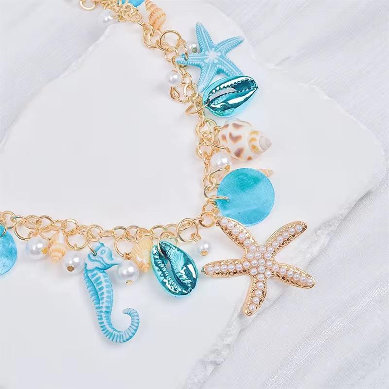 Pear starfish conch necklace
