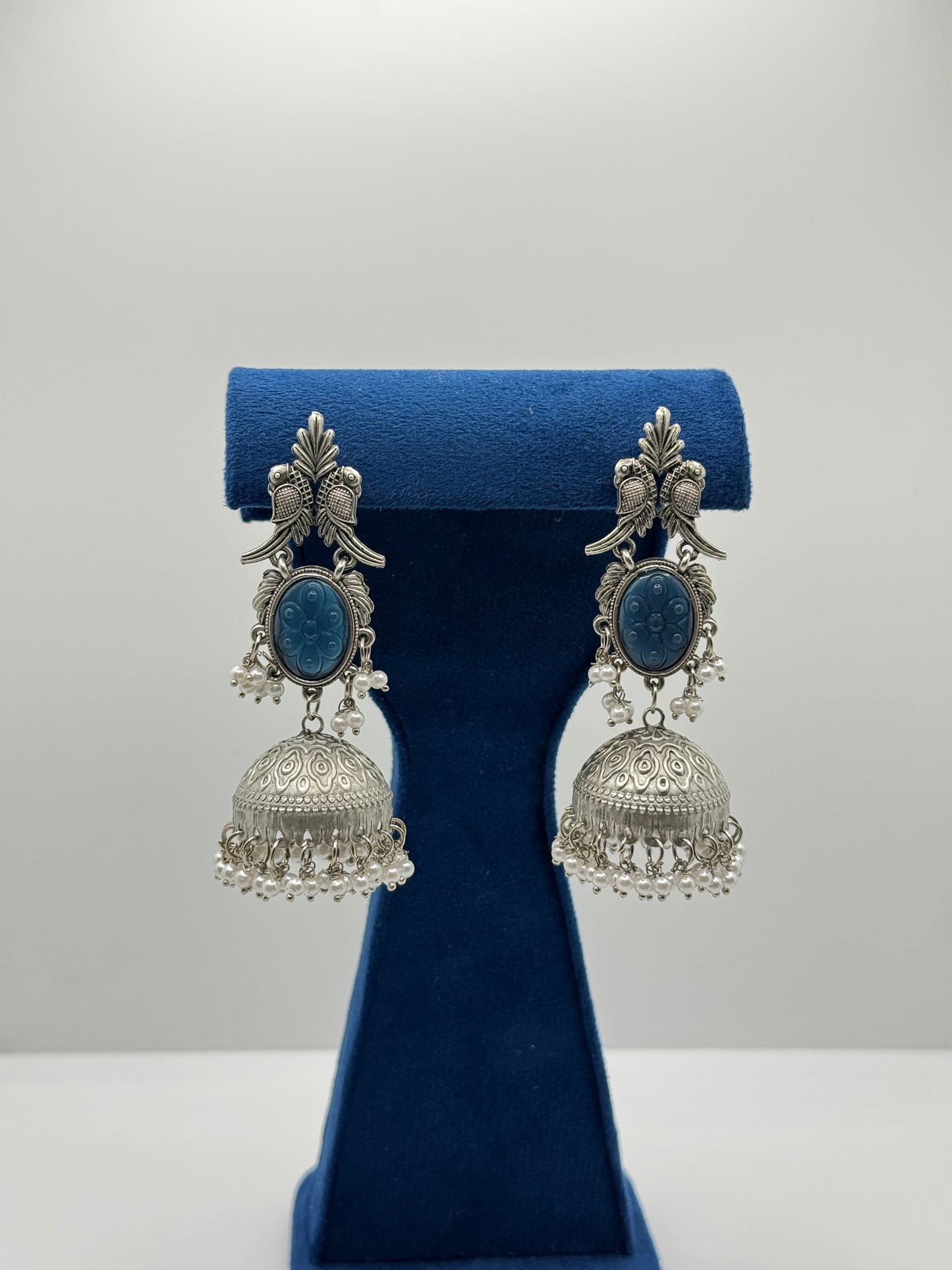 Deep Blue Carved Stone Peacock Jhumkas