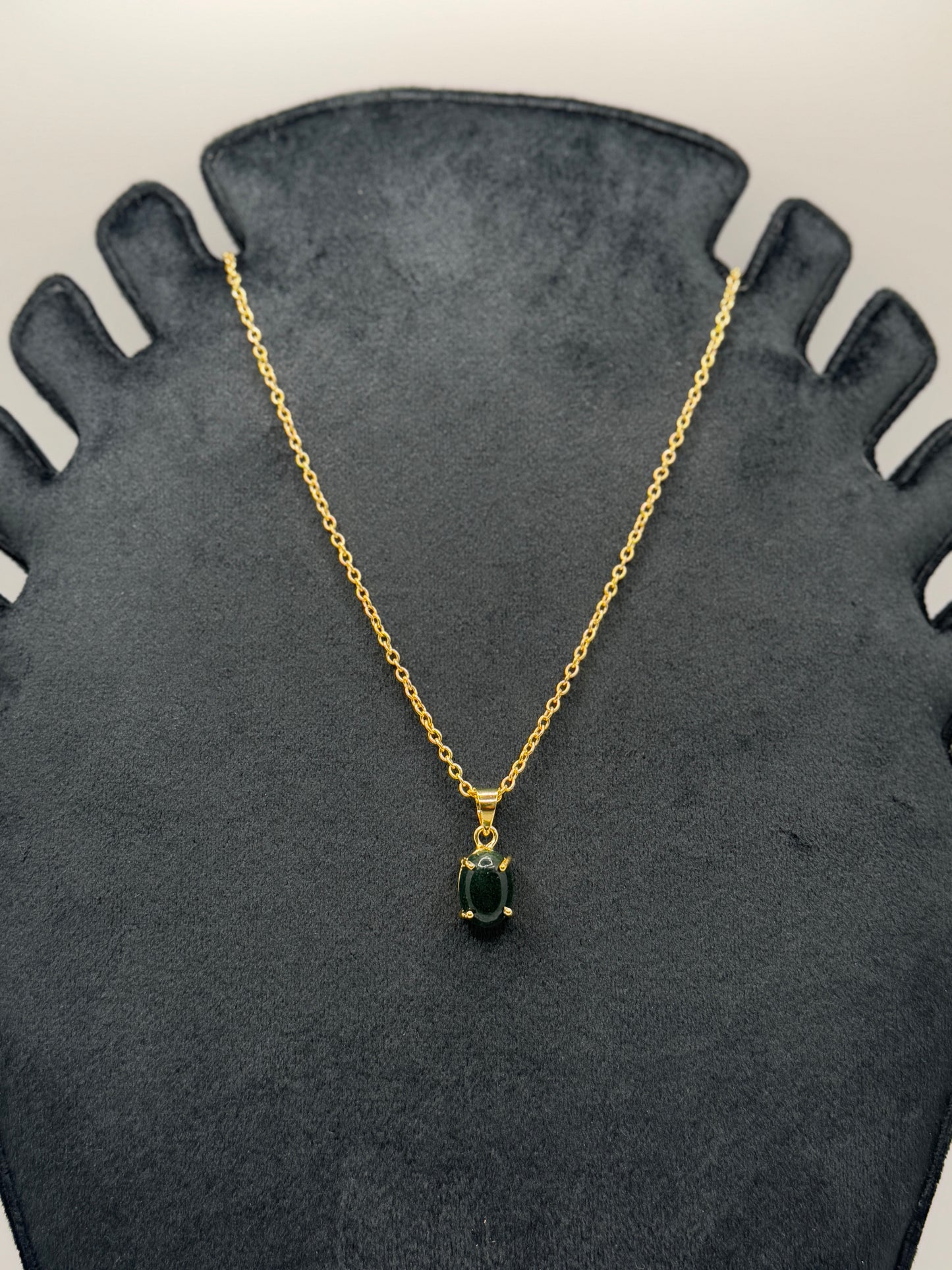 Gold Chain Necklace with Oval Dark Gemstone Pendant