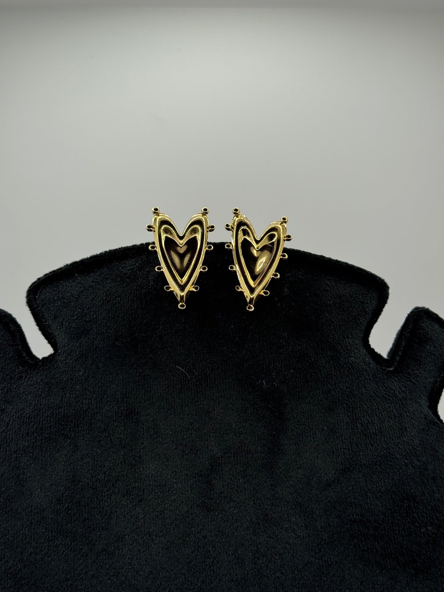 Heart-Shaped Stud Earrings with a Piped Edge and a Smaller Inner Heart