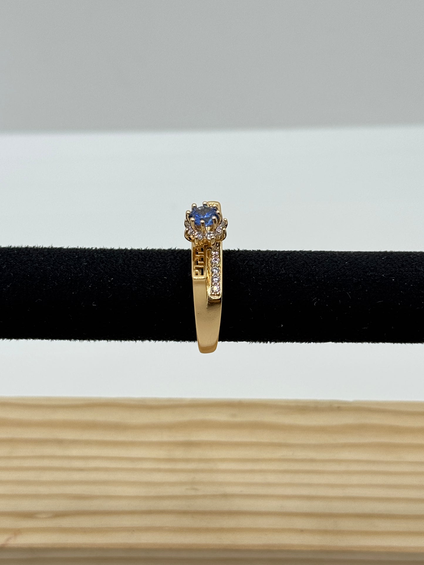Gold Tone Ring with Blue Stone and Geometric Detail