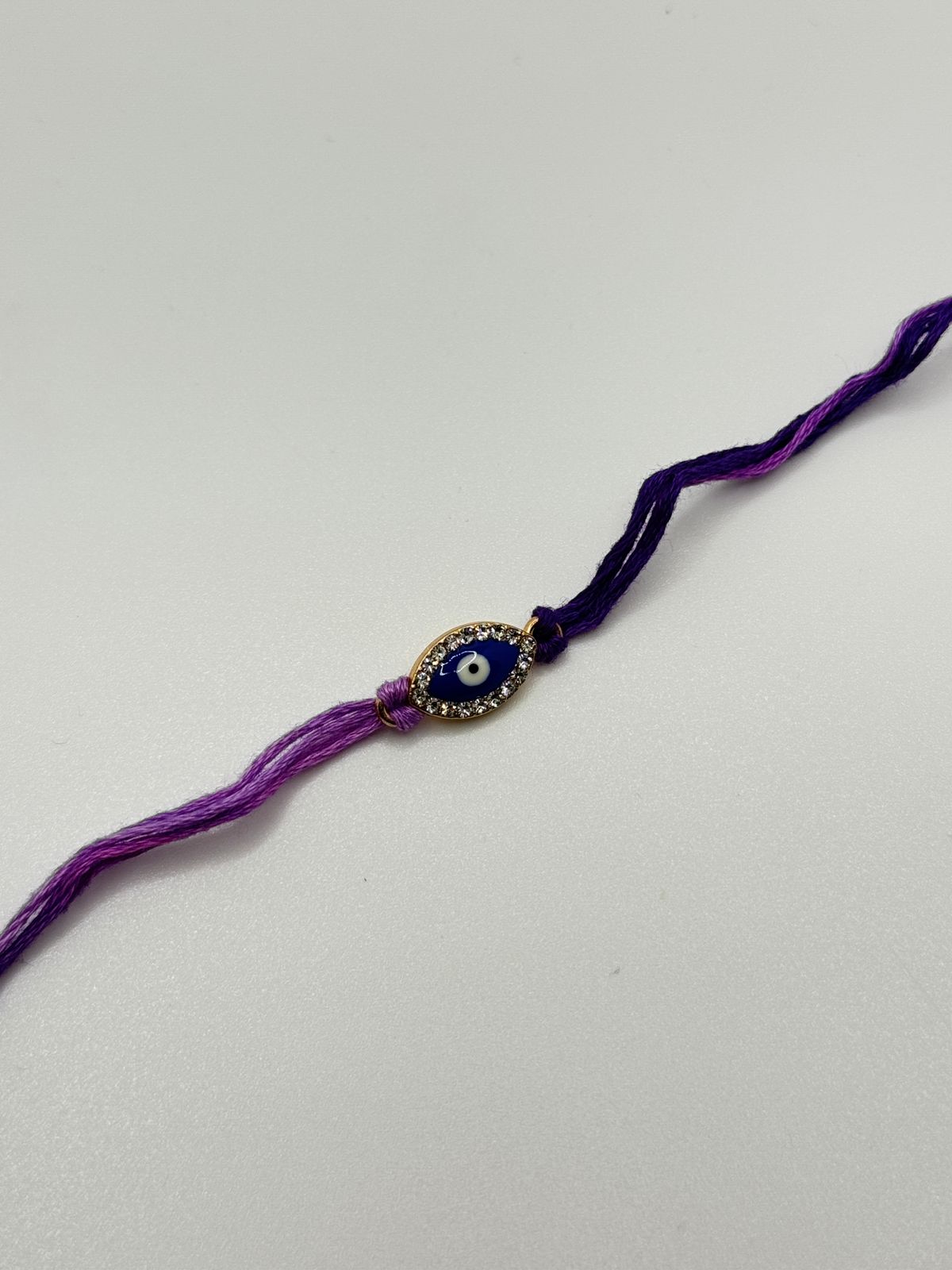 Evil eye charm rakhi blue base