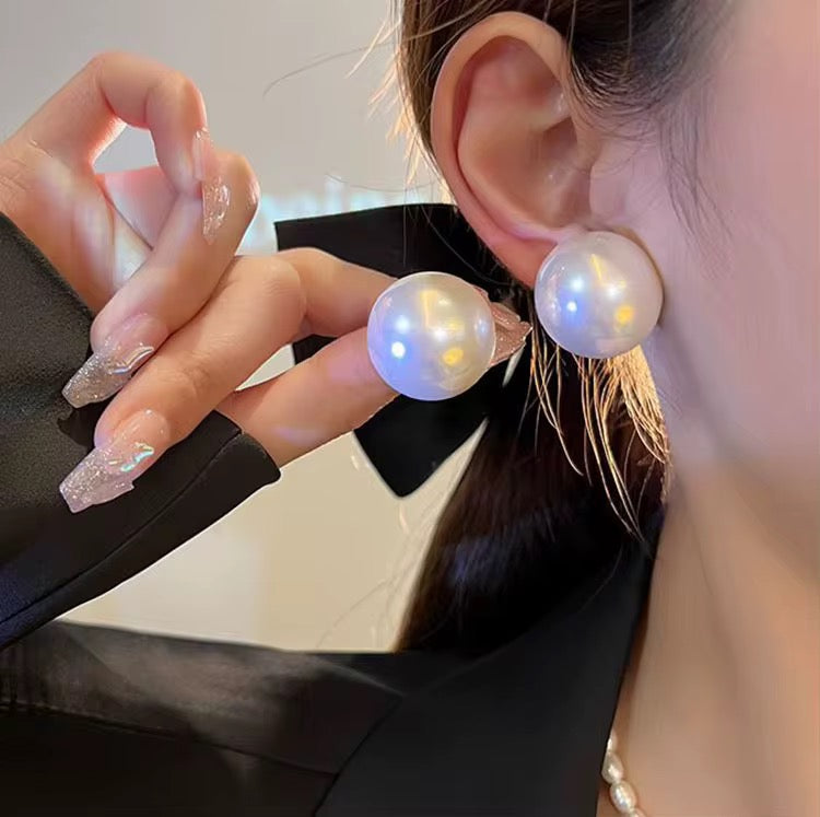 Oversized pearl earrings