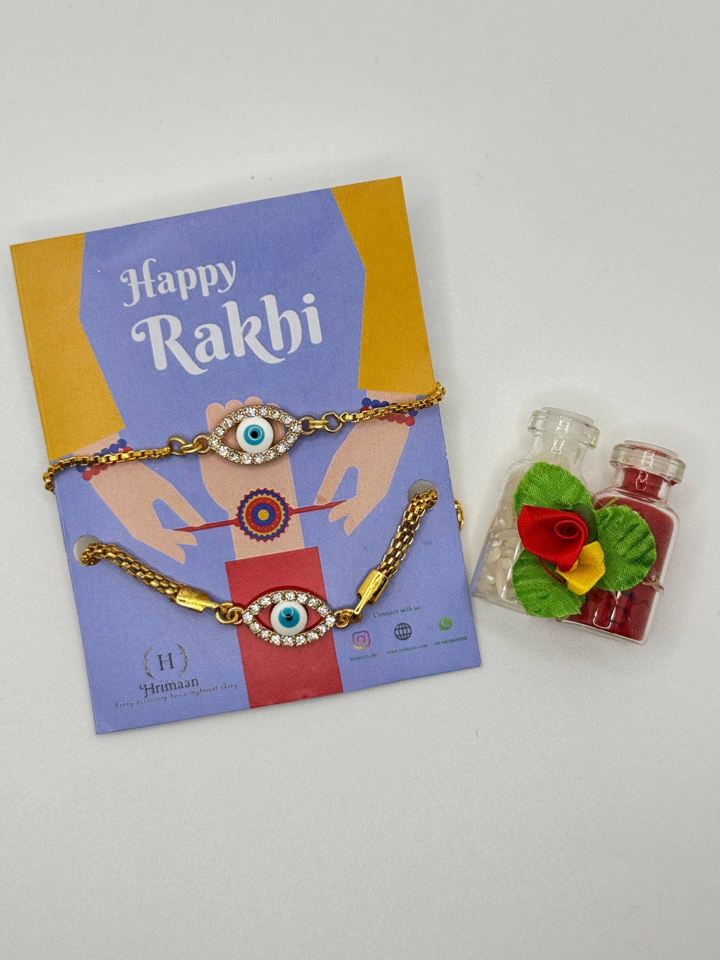 Evil Eye Duo Charm Rakhi for Bhaiya bhabhi  with kumkum and rice– Gold-Toned Protection Set