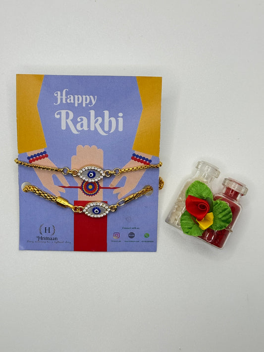 Evil Eye Duo Charm Rakhi for Bhaiya bhabhi  with kumkum and rice– Gold-Toned Protection Set