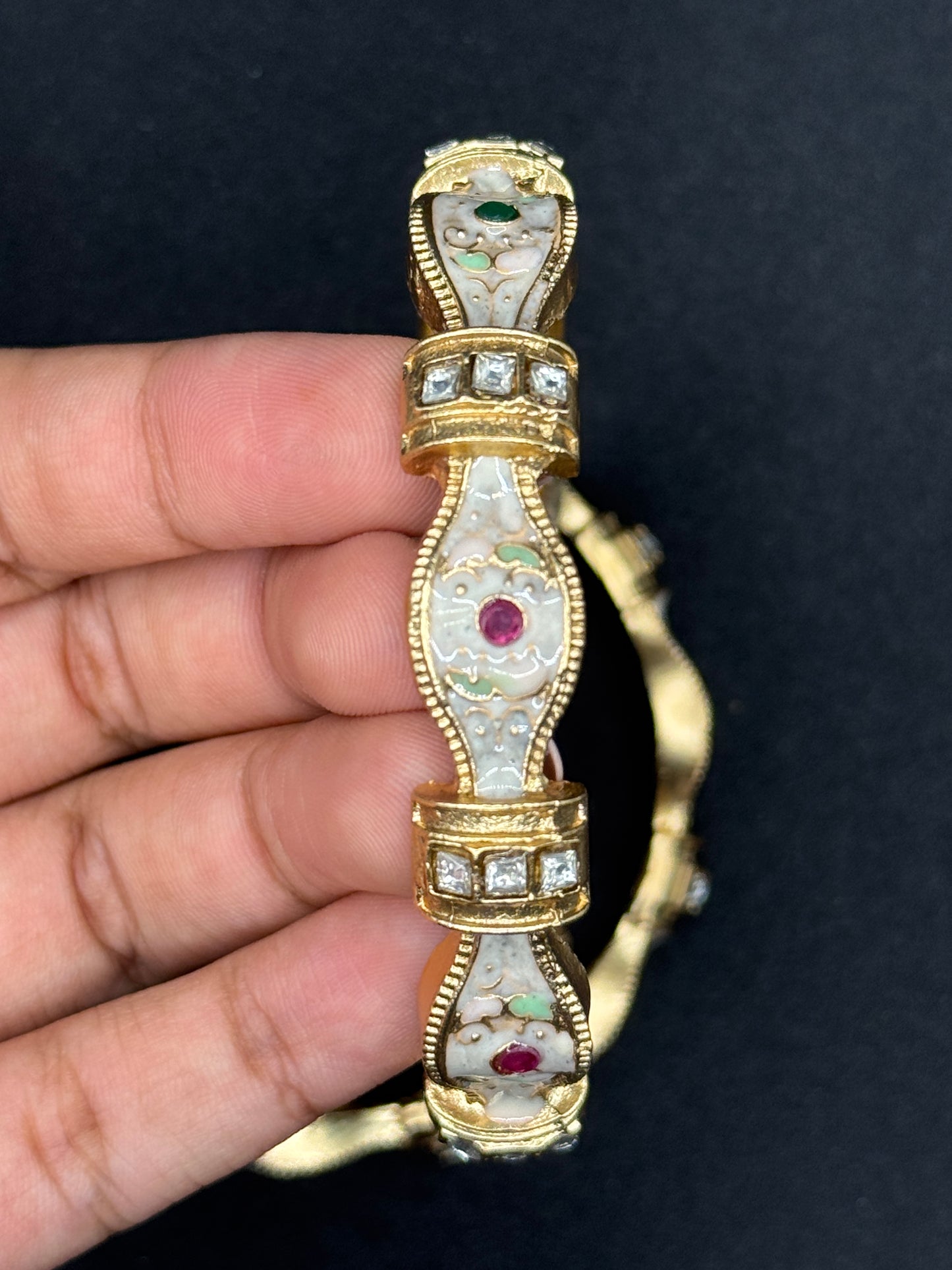 Striking Gold Bracelet with Ornate Reliefs and Gemstone Inlays 2*8