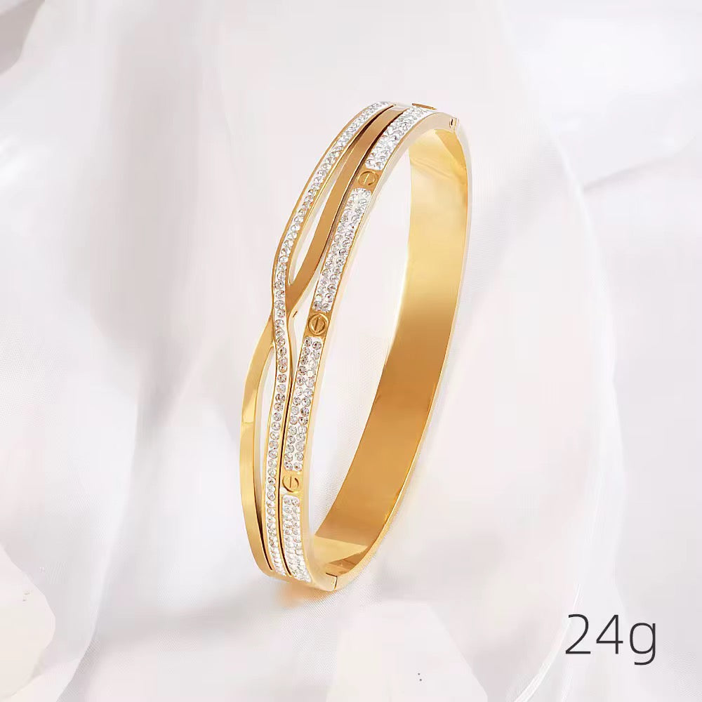 Wave bracelet in stainless steel golden colour