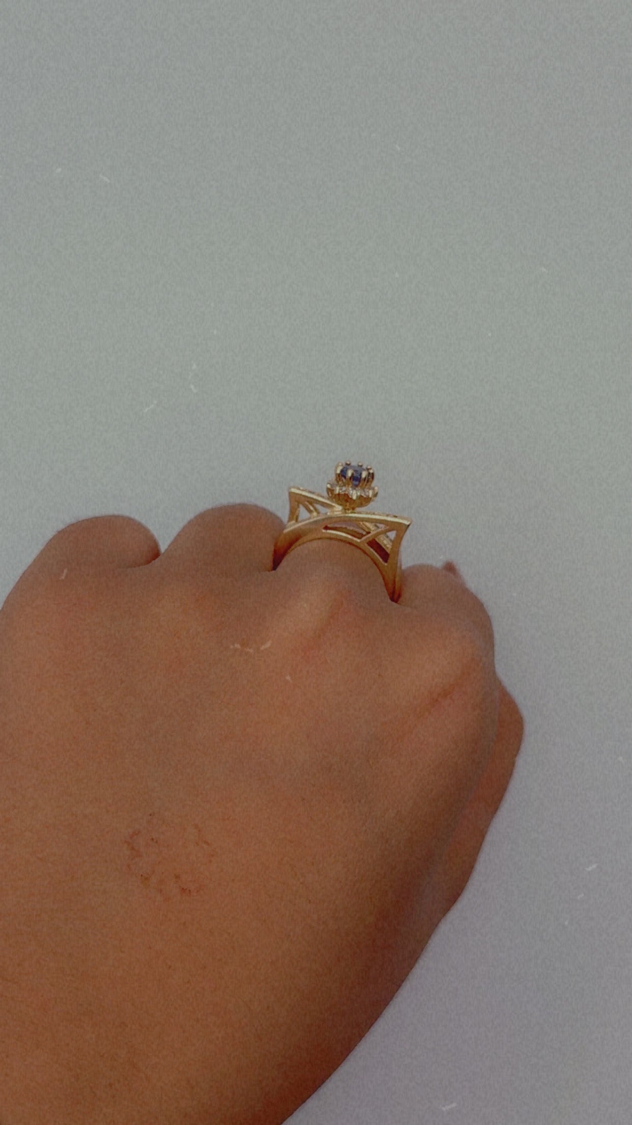 Gold Tone Ring with Blue Stone and Geometric Detail