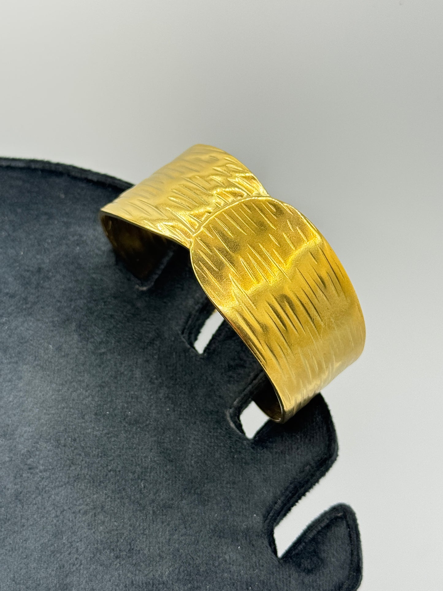 Wide Textured Gold Cuff Bracelet with Interlocking Design