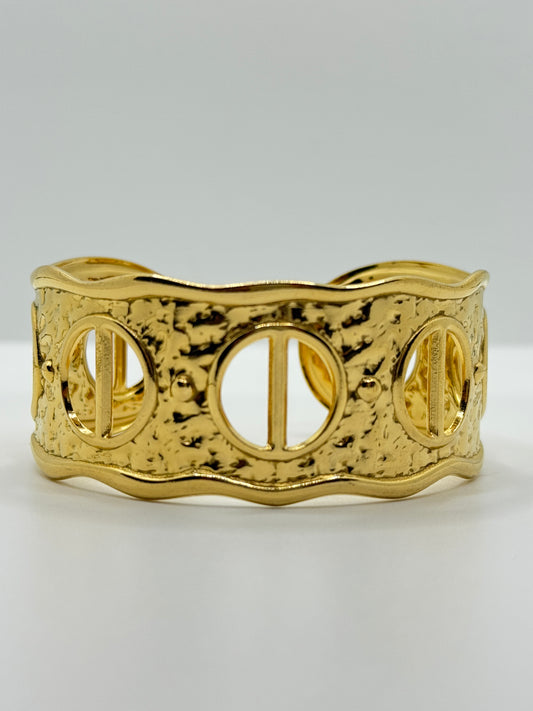 Ornate Gold Cuff Bracelet with Circular Cut-Outs
