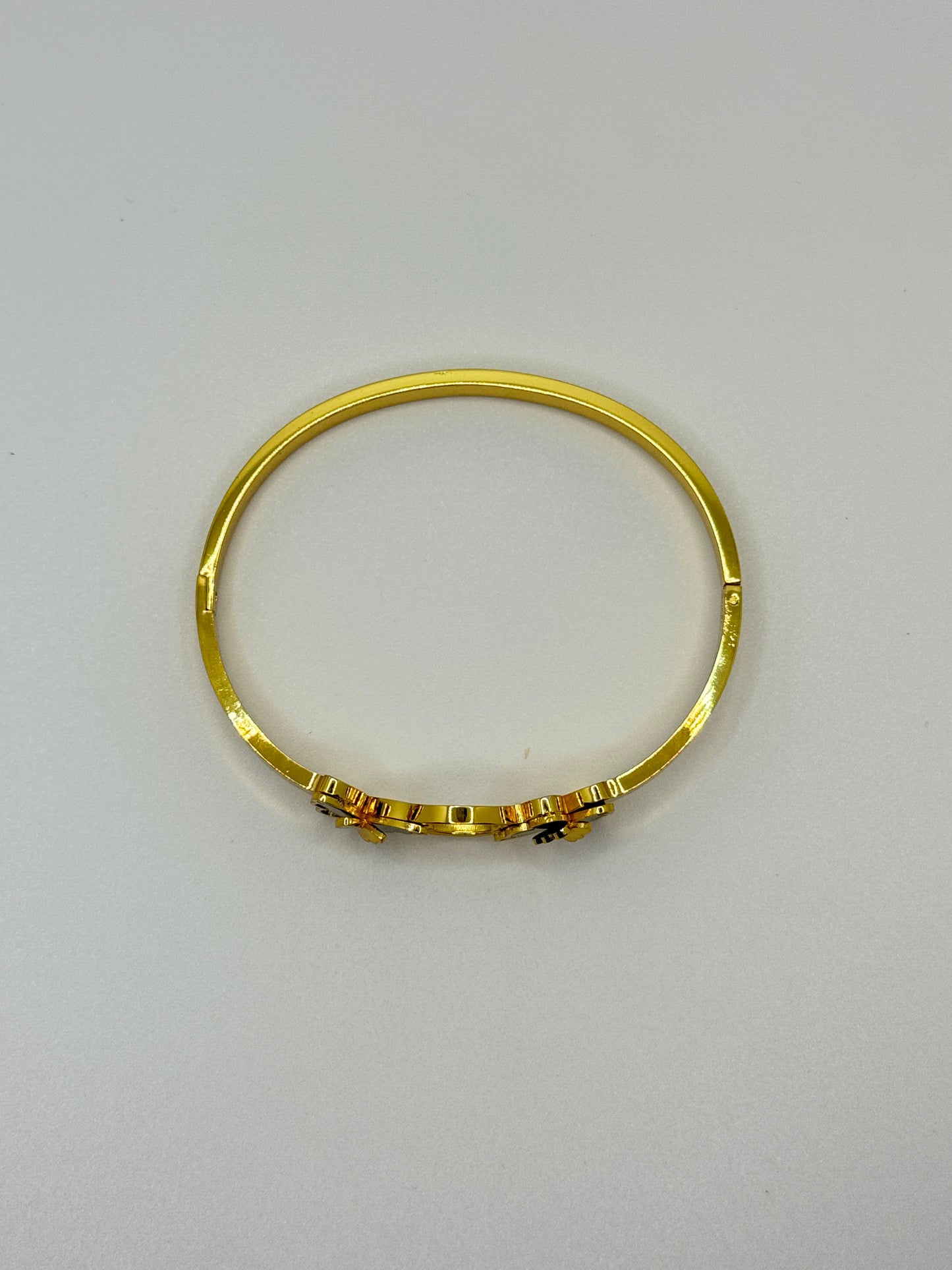 Gold Bangle with Black Butterfly Accents