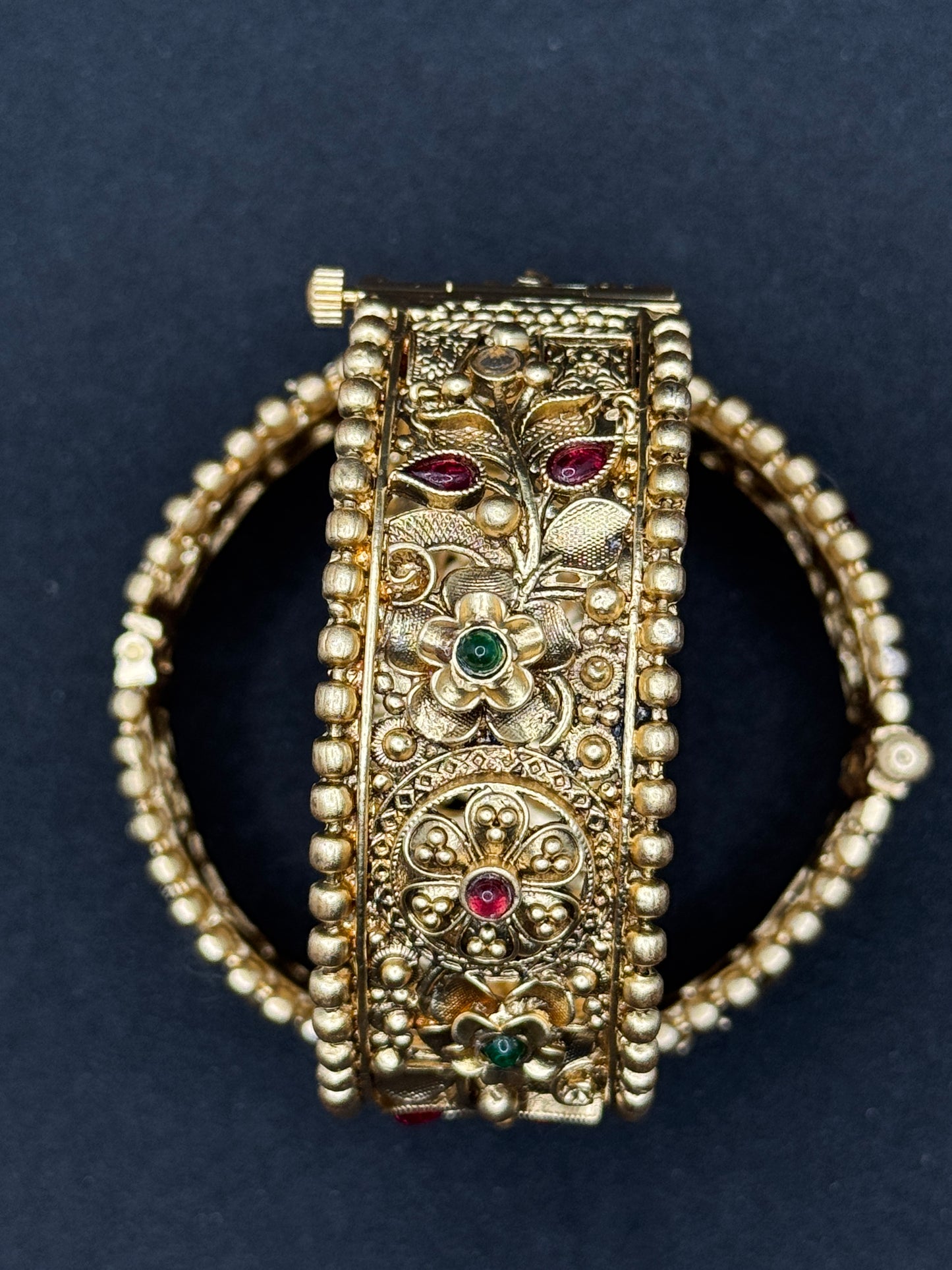 Antique Design Gold Bangles with Intricate Carvings and Gemstones
2*6