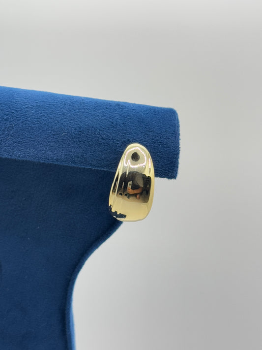 Polished Gold Teardrop Earring on Blue Display