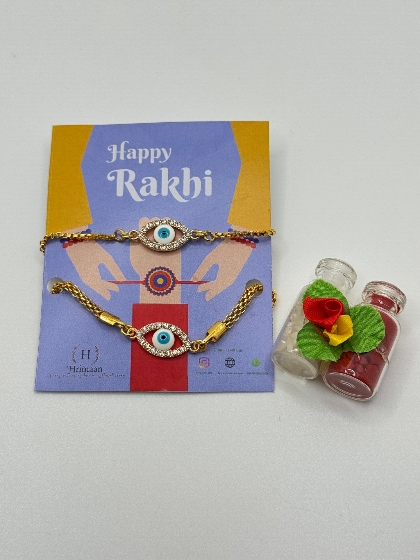 Evil Eye Duo Charm Rakhi for Bhaiya bhabhi  with kumkum and rice– Gold-Toned Protection Set