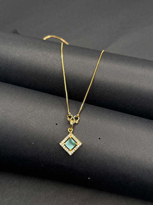 Necklace with chain and green stone
