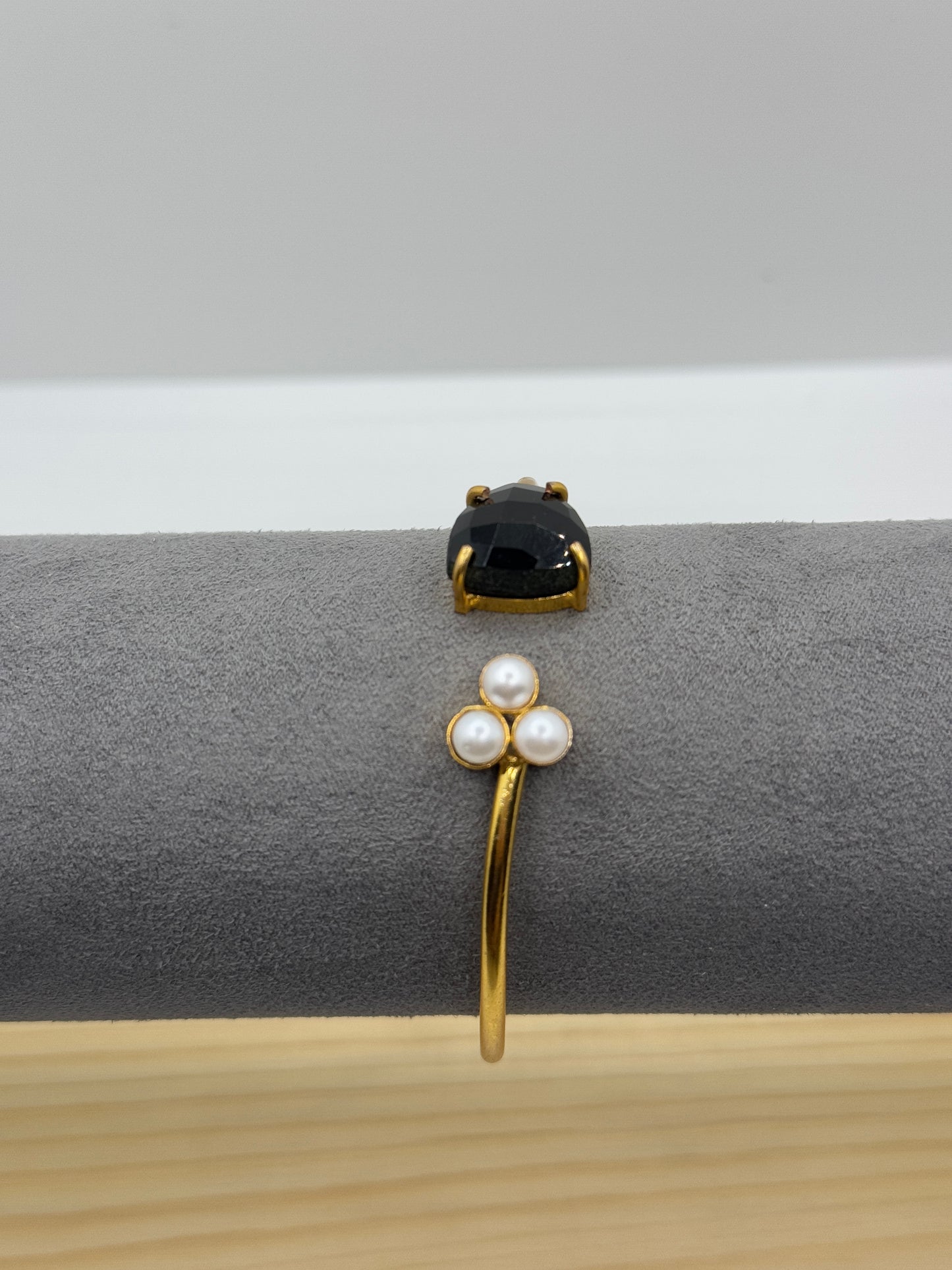 Open Gold Bangle with Black Teardrop Stone and Pearls