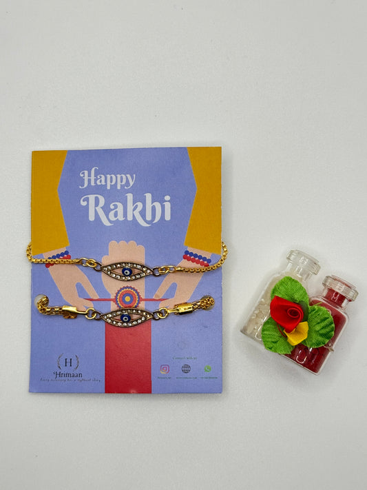 Evil Eye Duo Charm Rakhi for Bhaiya bhabhi  with kumkum and rice– Gold-Toned Protection Set