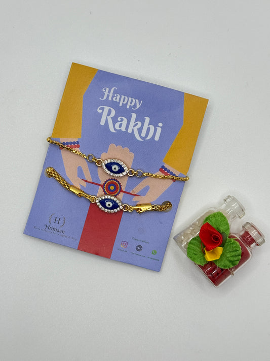 Evil Eye Duo Charm Rakhi for Bhaiya bhabhi  with kumkum and rice– Gold-Toned Protection Set