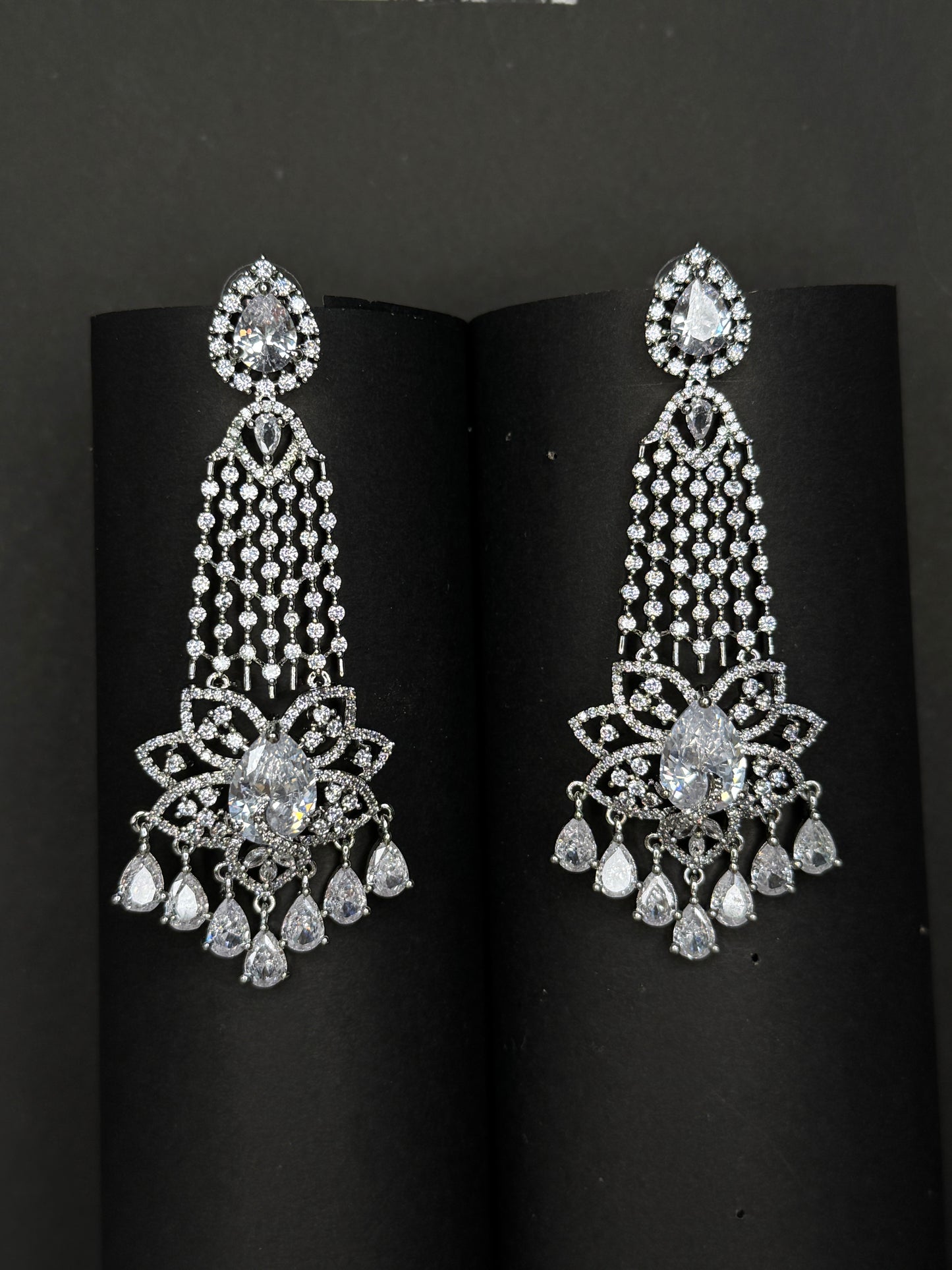 Long american diamond earrings