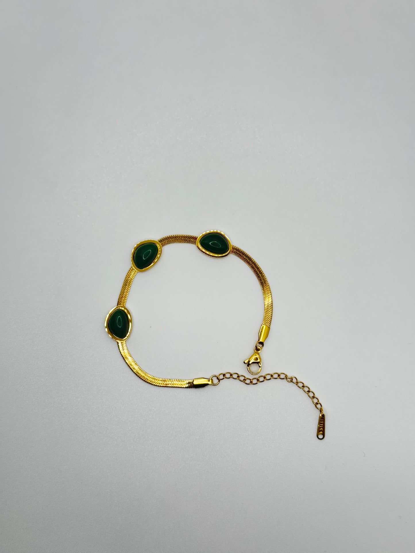 Gold Tone Snake Chain Bracelet with Green Cabochons