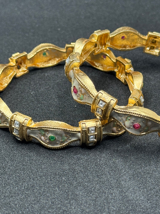 Striking Gold Bracelet with Ornate Reliefs and Gemstone Inlays 2*8