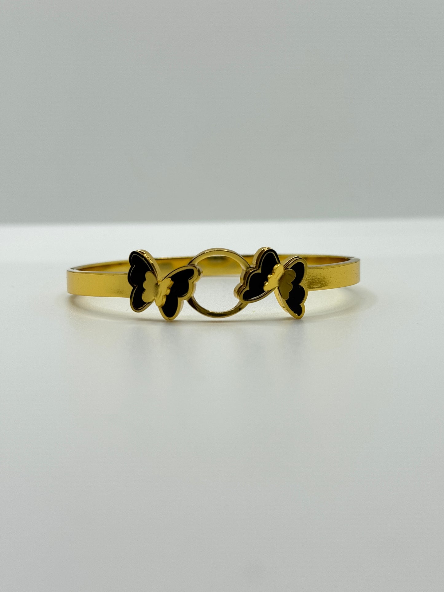 Gold Bangle with Black Butterfly Accents