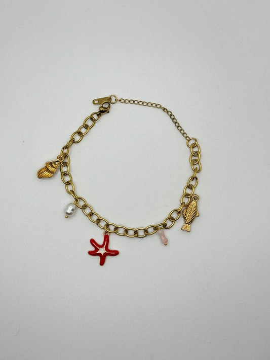 Gold Charm Bracelet with a Red Starfish, Fish, and Shells