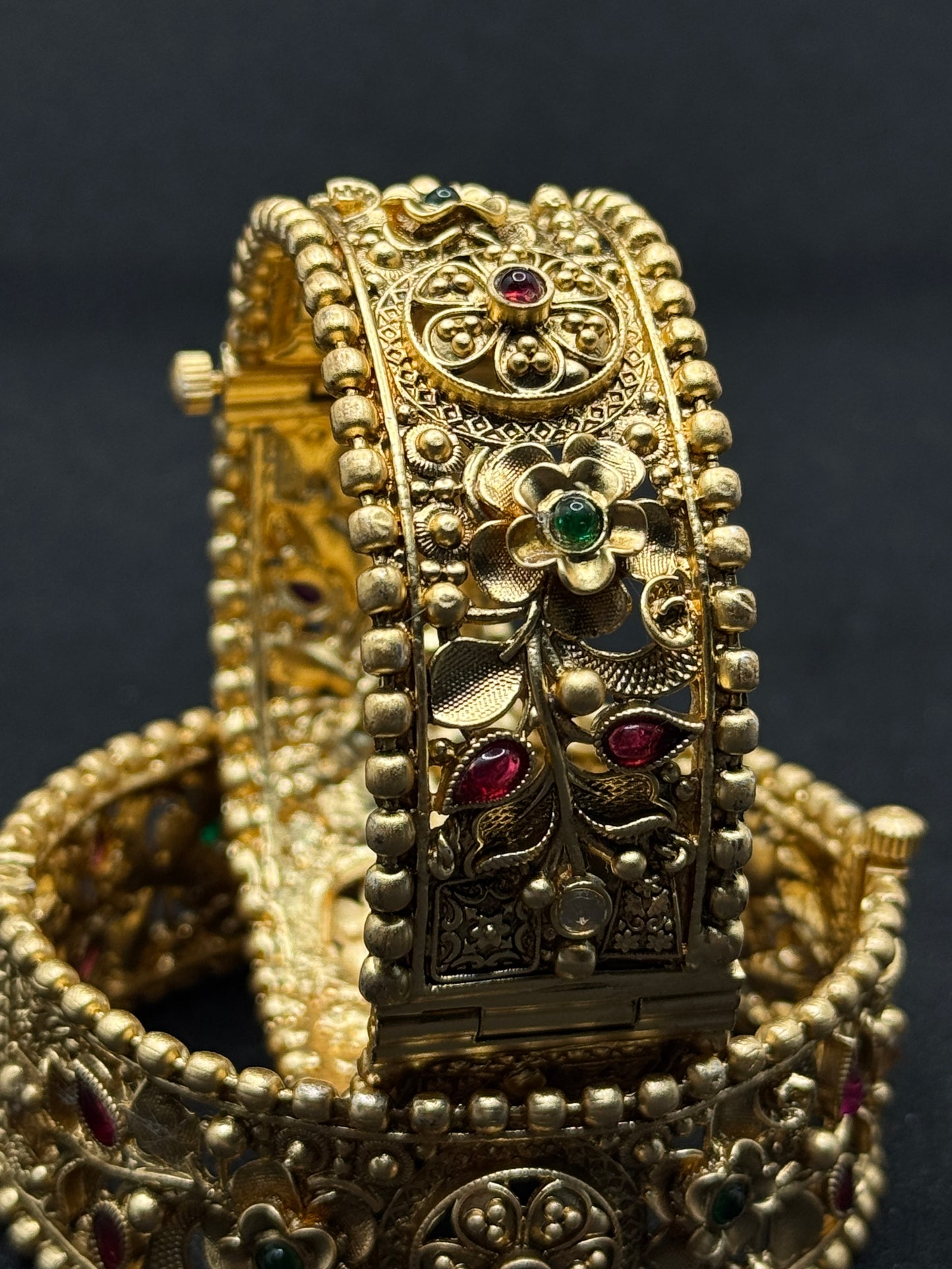 Antique Design Gold Bangles with Intricate Carvings and Gemstones
2*6