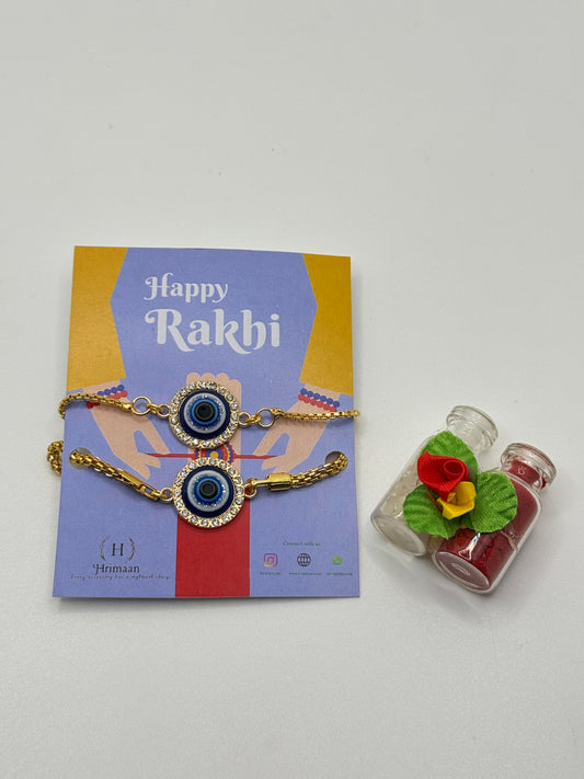 Evil Eye Duo Charm Rakhi for Bhaiya bhabhi  with kumkum and rice– Gold-Toned Protection Set