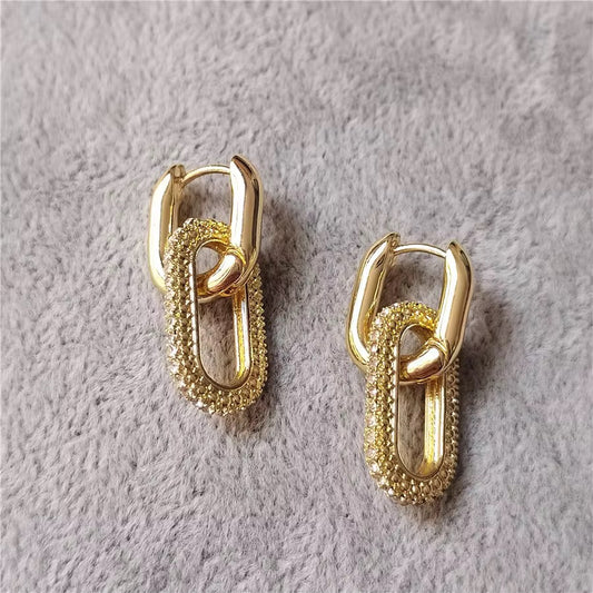 A stylish pair of chunky two interlocking chain earrings
