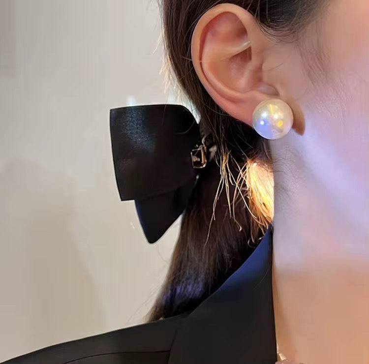 Oversized pearl earrings
